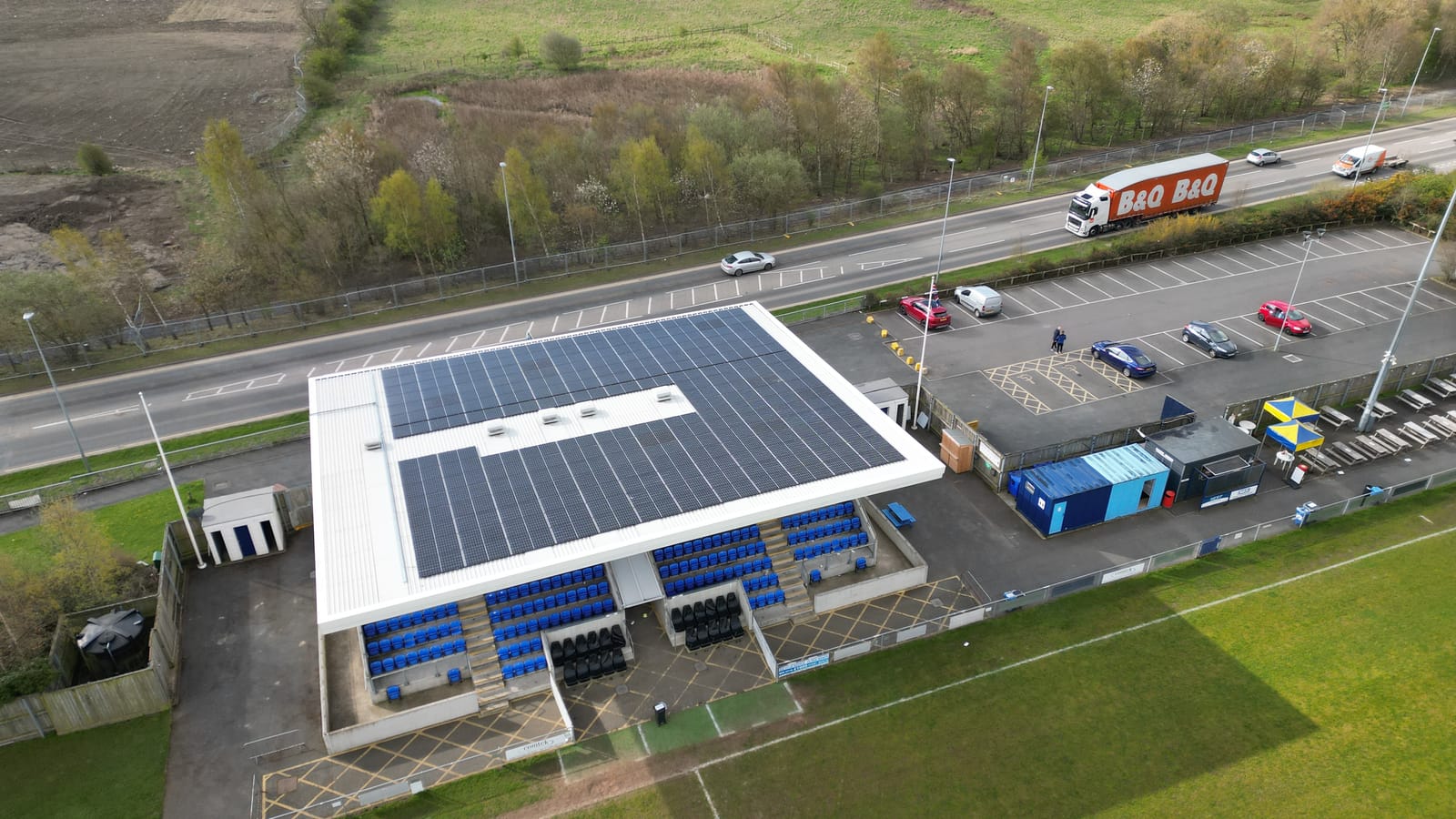 Aerial of the grandstand array with the football pitch alongside