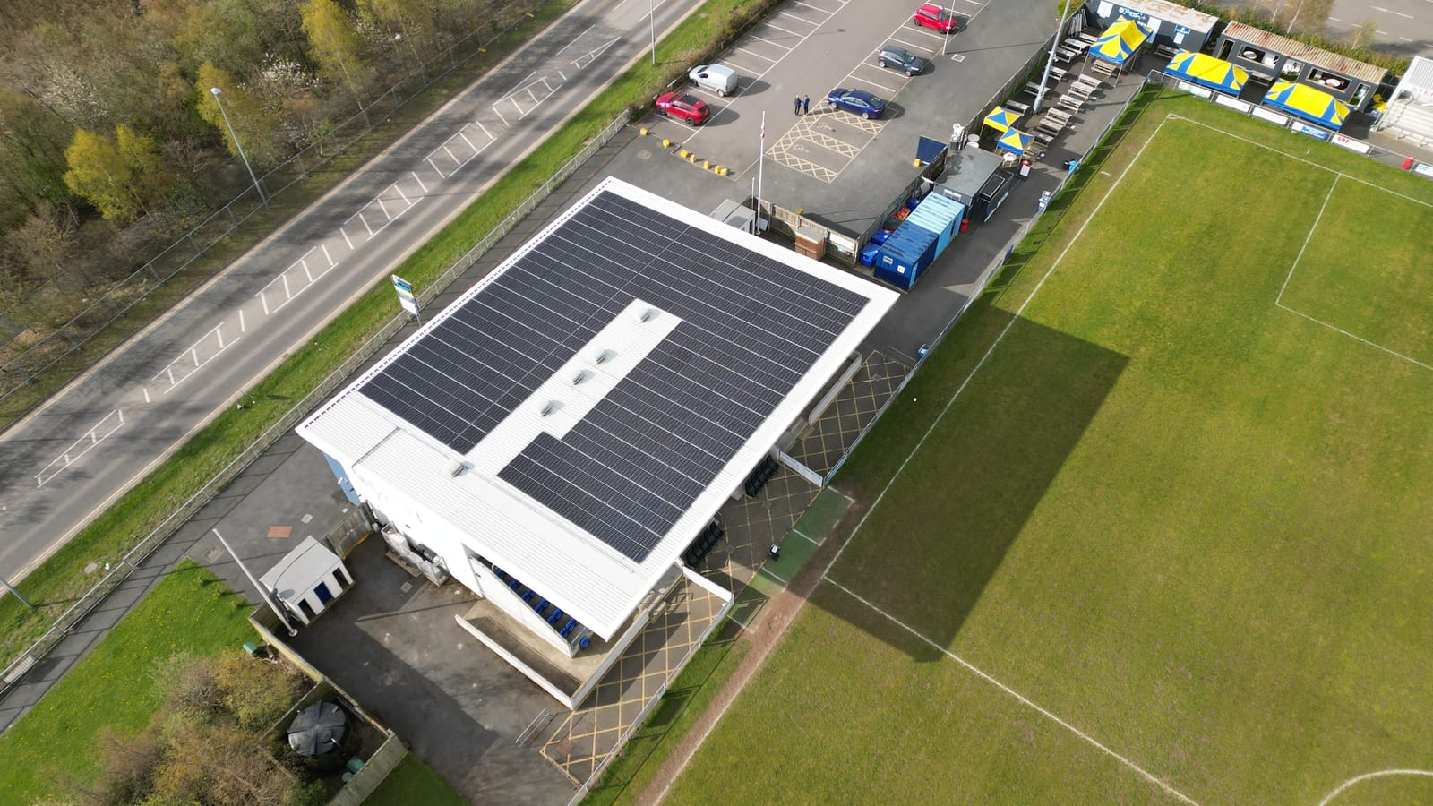 Close aerial of the solar panels across the grandstand roof