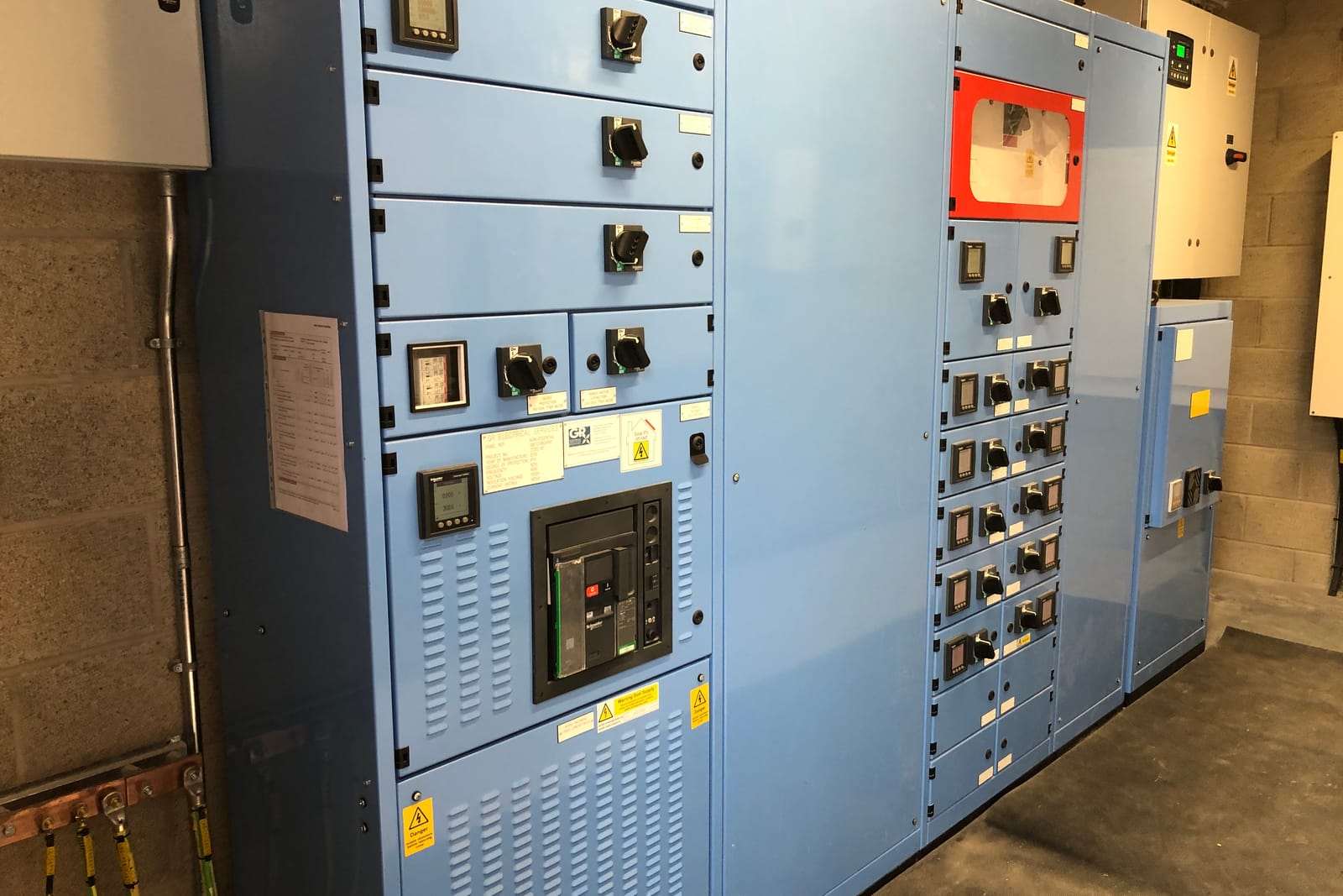 Close view of the blue LV switchgear panel installed at Spen Farm