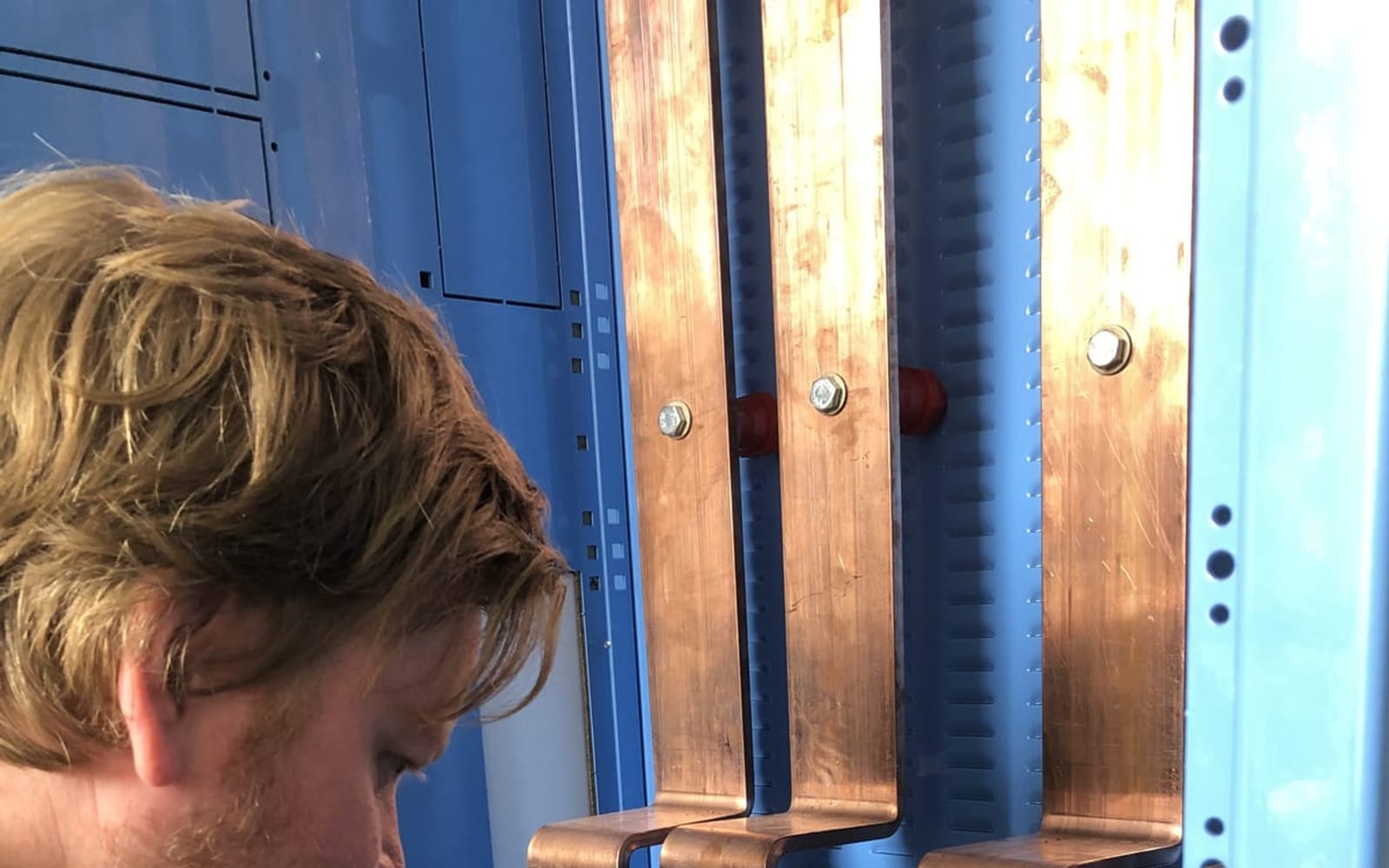 A G Smith engineer terminating busbars in the Spen Farm switchgear