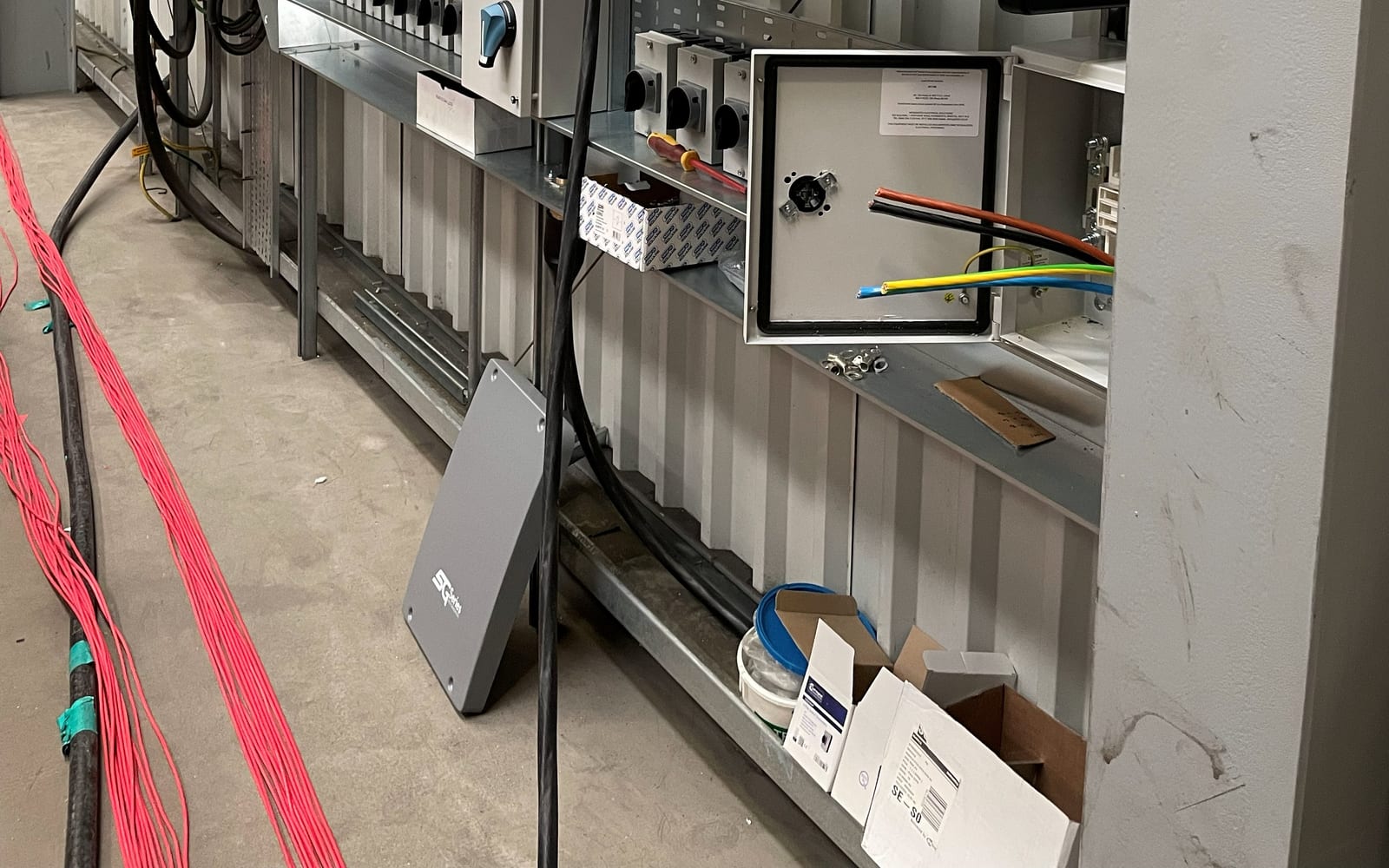 Commercial solar inverters and DC cabling in a plant room